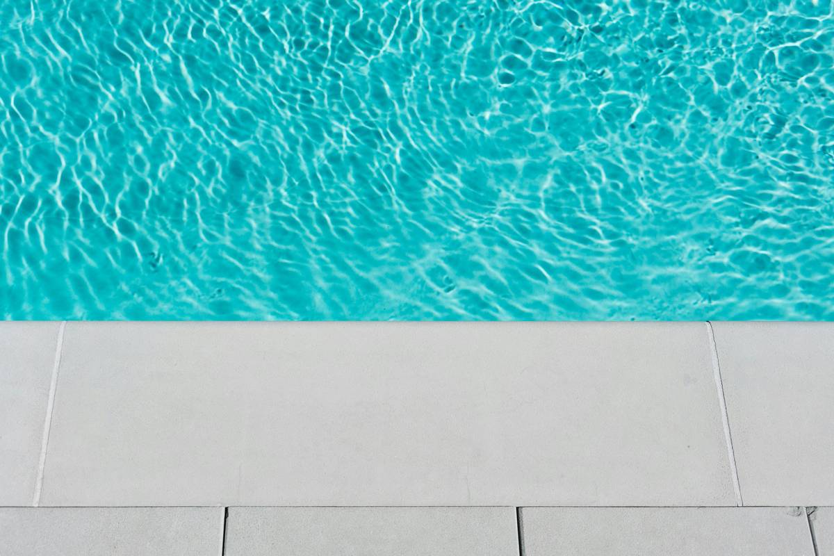 financial benefits of swimming shown via side-by-side cost comparison table with other fitness activities